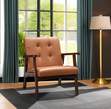 Mid-century modern tan leather armchair with dark wood frame in a bright living room.