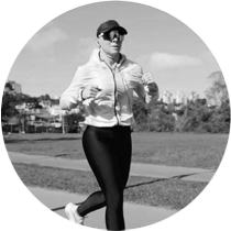 a woman in a white jacket and caprisp