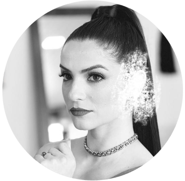 Nicole with a necklace and a necklace with a diamond