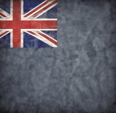 An assortment of dried fruits and nuts is neatly displayed. There are varieties such as dried apricots, figs, muska, and tropical fruits, all carefully arranged in rows with clear labels indicating their types. The colors range from bright oranges to deep browns and greens, creating a vibrant display.