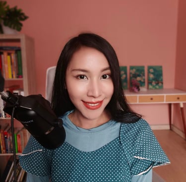 a woman is holding a hair dryer in her hand