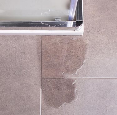 Leaky Silicone in bathroom partition