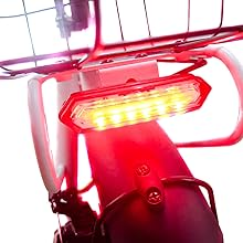 a bicycle with a basket basket on the back of it