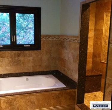 After tile installation, custom build shower, lighting update. Bathroom remodeled in Mount Prospect