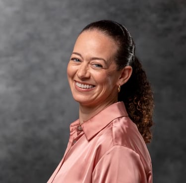 a woman in a pink shirt and a black shirt
