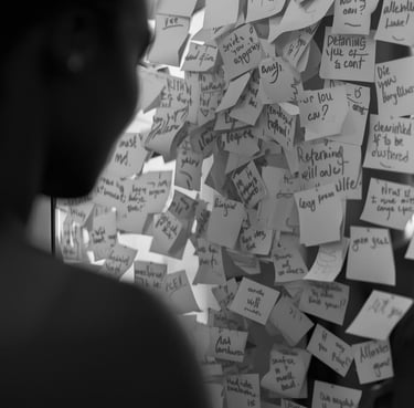 Editorial image showing affirmation notes on a mirror representing clarity and confidence building.