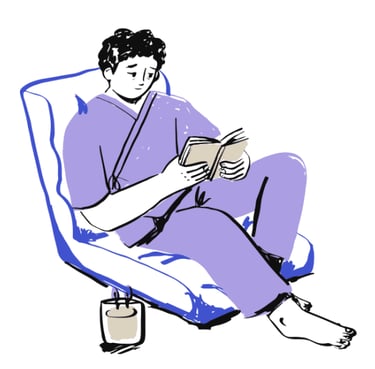 A man in a purple outfit sitting and reading looking rather sad