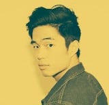 a man with a black jacket and a black jacket