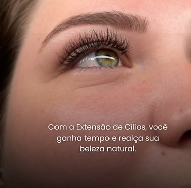 a woman with a large eyeliners and a green eyeliner