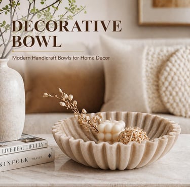 Modern fluted decorative bowl on a marble coffee table with minimalist home decor accents.
