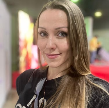a woman with long hair and a black shirt
