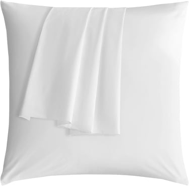 a white pillow with a white sheet and a white pillow