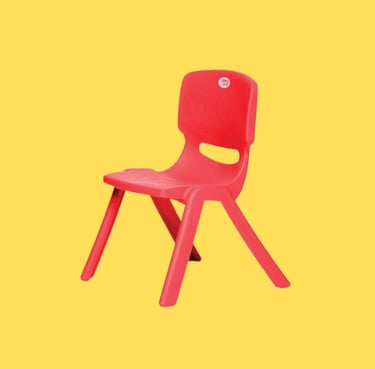 a red plastic chair with a red chair and a yellow background