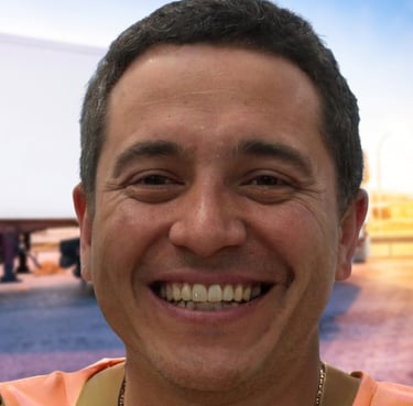 a man with a necklace on his neck