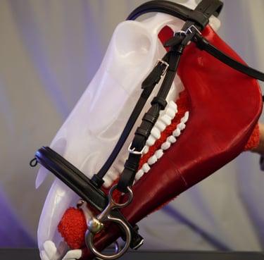 a horse with a red nose and white teeth