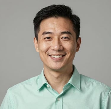 A close-up professional portrait of a business executive in a soft mint green shirt, smiling confidently against a neutral background. High-end corporate style.