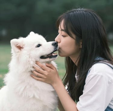 Technician in black uniform with nitrile gloves carefully calibrating a Sub-Zero refrigerator in a sleek modern kitchen.