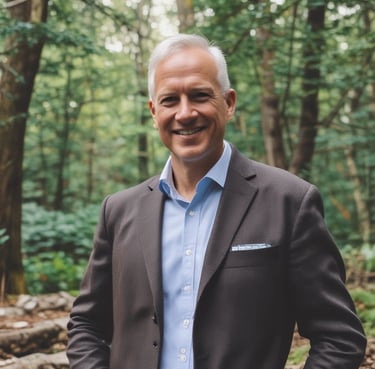 Photo of a smiling professional in business casual attire, representing a satisfied client.