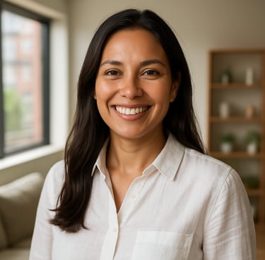 Portrait of a radiant South American woman in her late 30s with healthy, glowing skin, wearing a white professional linen shirt. She is smiling confidently in a brightly lit, modern Colombian apartment, representing the success and vitality of Atomy products.
