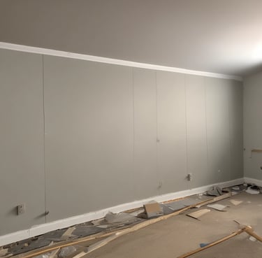 A freshly painted wooden house exterior glowing under soft sunlight.