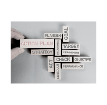a person holding a block of wood blocks with words on it