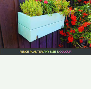 handmade planter box painted in blue with flowers and herbs 