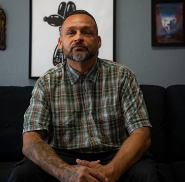 Tattoo artist Matt focused during a session at Aura Tattoo Studios, Lewisville’s top tattoo shop