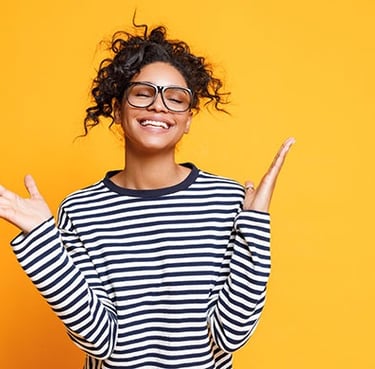woman smiling in stripey top