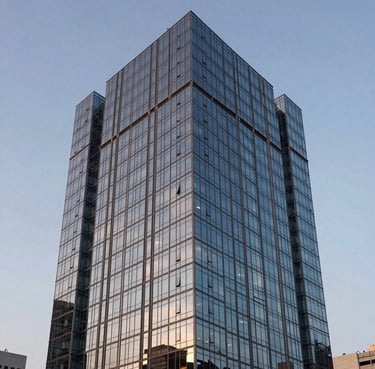 An architectural shot of a modern glass skyscraper in São Paulo, Brazil, reflecting a soft pale blue sky during twilight, conveying professional elegance and forward-thinking.