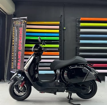 vespa-scooter-gloss-black-vinyl-wrap-one-7-garage.jpeg