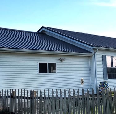 Steel roof installed to local home by Gotcha Covered Builders.
