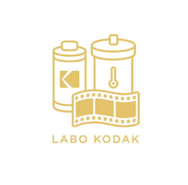 Gold Labo Kodak logo featuring 35mm film rolls and developing tanks on a black background.