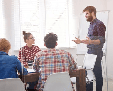 Professional Team Collaboration – A diverse team of professionals working together in an office.