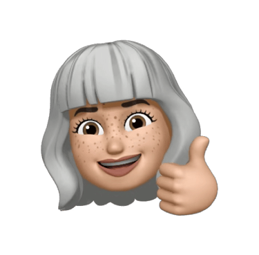 Smiling female Memoji with freckles and grey hair giving a thumbs up gesture on a black background.