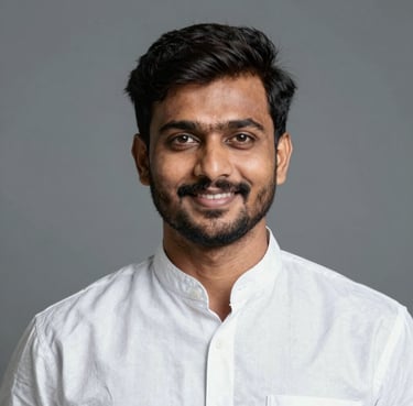 Portrait of a confident young man with a subtle smile, set against a dark, glowing background.