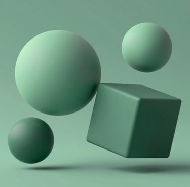 Abstract geometric shapes in 3D, spheres and cubes floating in a balanced arrangement. The surfaces are matte, using the colors #A7C5C3 and #3F5E5C. Clean, professional, and understated.