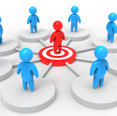 a group of people standing around a target target