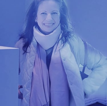 a woman in a white jacket and scarf