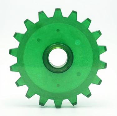 A translucent green plastic industrial gear wheel isolated on a white background.