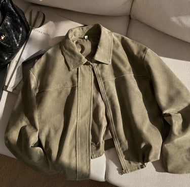 Oversized khaki jacket with soft suede look and classy aesthetic