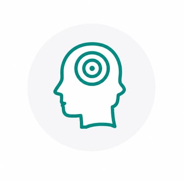 Teal icon of a human head silhouette with a target symbol inside representing focus and mental clarity.