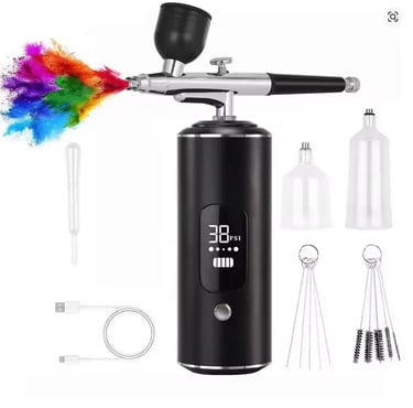 Portable handheld airbrush kit with compressor and digital display for painting and makeup.