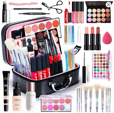Professional makeup kit with foundation, eyeshadow palettes, lipsticks, and brushes in a black travel case.