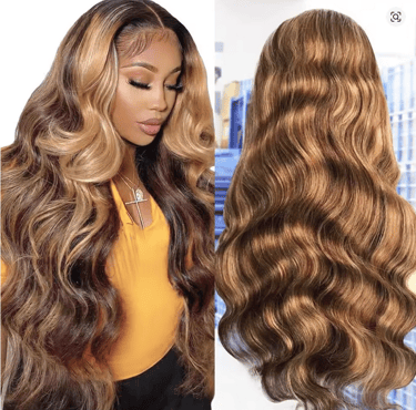Woman wearing a long honey blonde lace front wig with voluminous body waves and highlights.