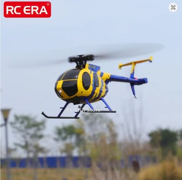 Yellow and blue RC Era K369E remote control helicopter flying outdoors.