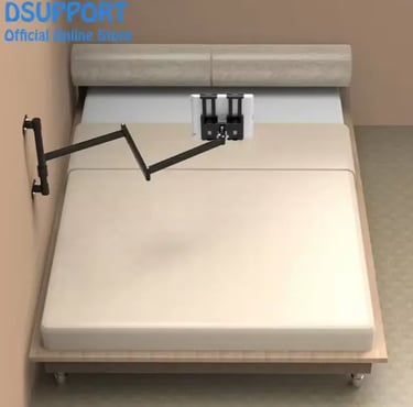 Adjustable long arm wall mount tablet holder positioned over a bed for hands-free viewing.