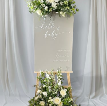Baby shower welcome sign with flowers