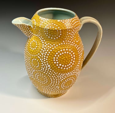 Large pitcher, stoneware, glazed on inside, dotted on outside