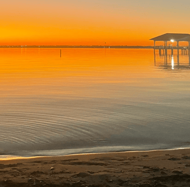 Sebring City Pier on the lake Jackson with a sunset view