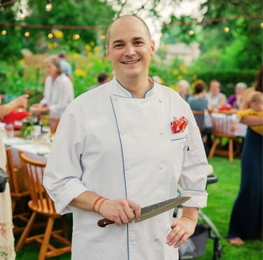 Chef Andrew in a garden dinner party.
